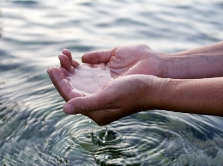 Hands in water