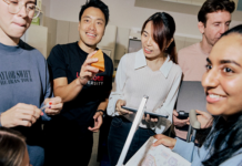 A group of health students standing in a group smiling